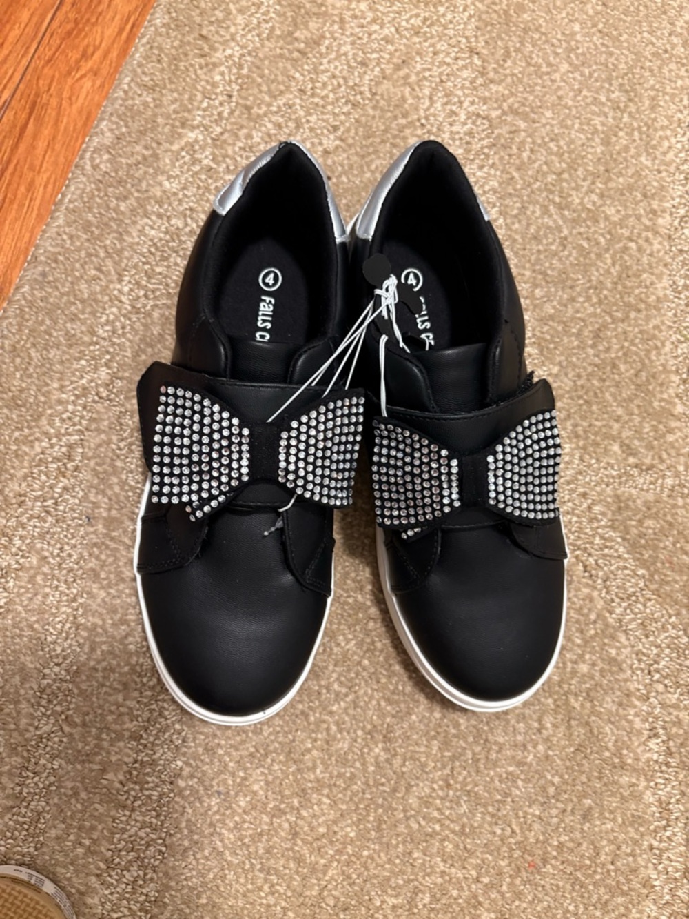 NWT. Falls Creek Black Slip-On Sneakers with Crystal Bow